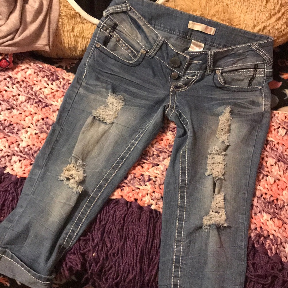 High waisted distressed capris